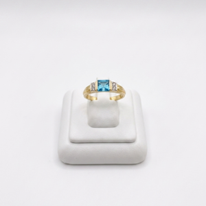 Bague or jaune, diamant et topaze bleu